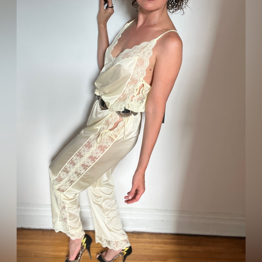 Lingerie jumpsuit made of nylon and lace with cute ties on the side. Open size. - Picture 4 of 14